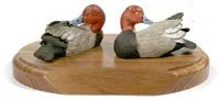Redhead Ducks on a Base